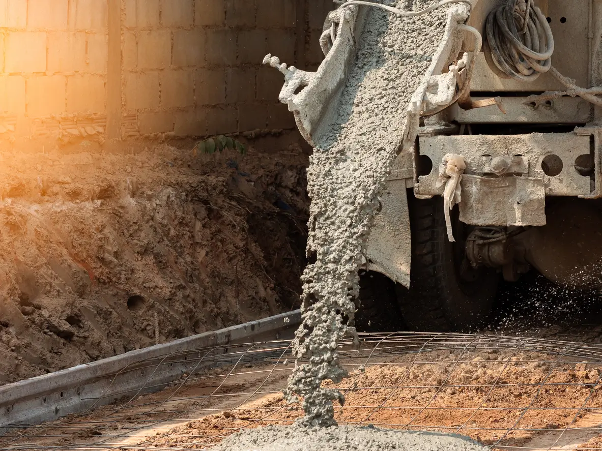 Concrete being poured for residential foundation installation